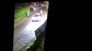 Armed men disguised in hazmat suits chase wrong victim down the street