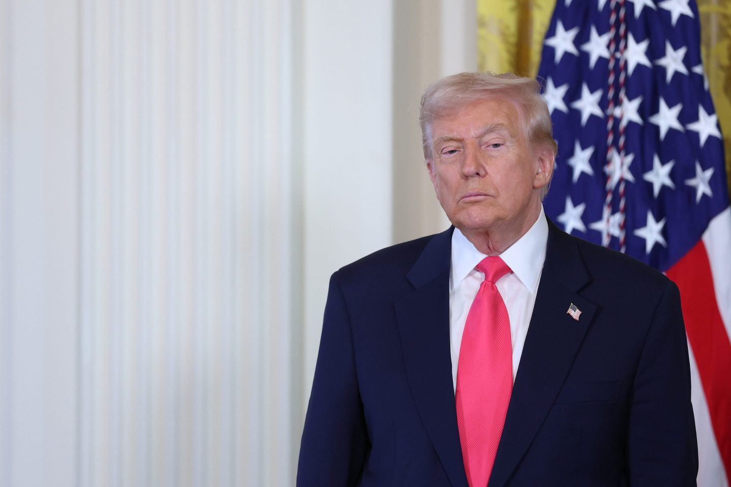 President Donald Trump listens as first lady Melania Trump speaks at a signing ceremony for the &quot;Fostering the Future&quot; executive order in the East Room of the White House on November 13, 2025 in Washington, DC.