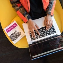 Python book and laptop