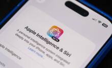 A photograph of an iPhone displaying a beta version of Apple Intelligience-powered Siri