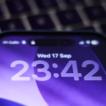 iOS 26 locked screen is seen displayed on a phone screen in this illustration photo