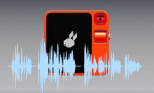 Rabbit R1 with audio waveform superimposed on it