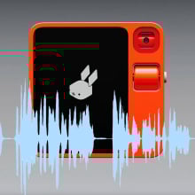 Rabbit R1 with audio waveform superimposed on it