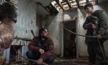 Alfie Williams and Aaron Taylor-Johnson in "28 Years Later"