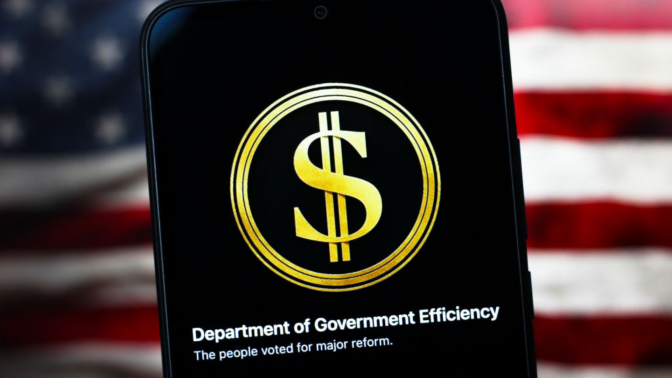 The United States Department of Government Efficiency (DOGE) logo is seen displayed on a smartphone screen.