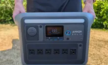 man holding anker solix power station