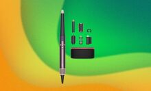 A Dyson Airwrap and its parts appears on a swirly green and yellow background.