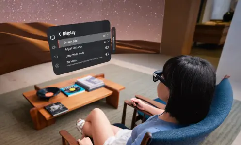 woman wearing The XREAL One Pro AR glasses in living room