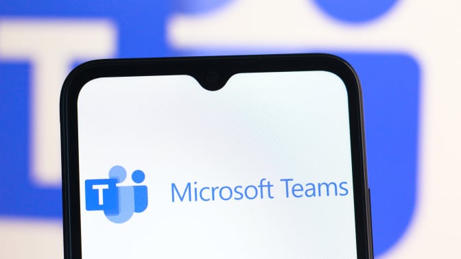 the Microsoft Teams logo is seen displayed on a smartphone screen