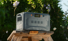 Bluetti Apex 300 solar generation on table outdoors