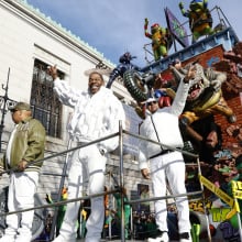 Busta Rhymes on the World of the Teenage Mutant Ninja Turtles float during the 2025 Macy's Thanksgiving Day Parade