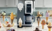 ninja swirl on kitchen counter surrounded by cones and bowls of ice cream and soft serve