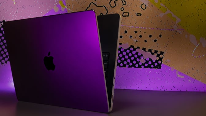 the new m5 macbook pro stands open on side