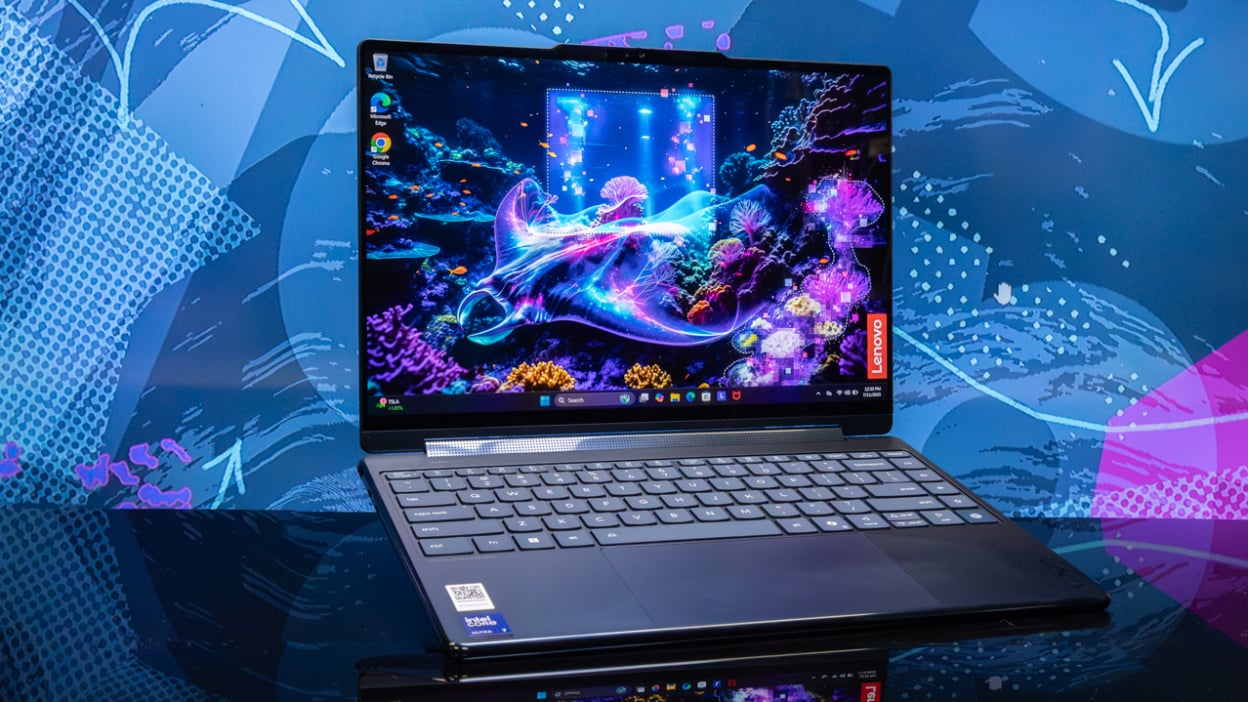 lenovo yoga 9i aura edition against abstract colorful background