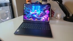 lenovo yoga 9i aura edition 2-in-1 laptop on a desktop