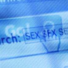 blurry pixelated close-up of browser bar that reads 'sex'