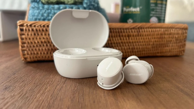 A pair of Bose QuietComfort earbuds