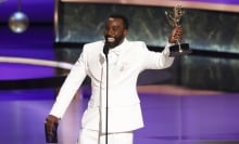 Tramell Tillman accepts his Emmy onstage.
