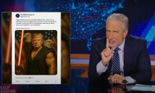 A man in a suit sits behind a talk show desk. In the top-left is an image of the President holding a lightsaber.